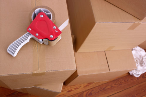 Tape cutter on storage box