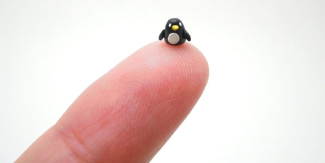 penguin on fingertip