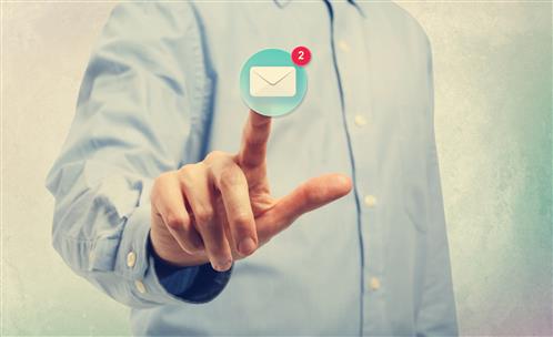 young-man-pointing-at-an-email-icon