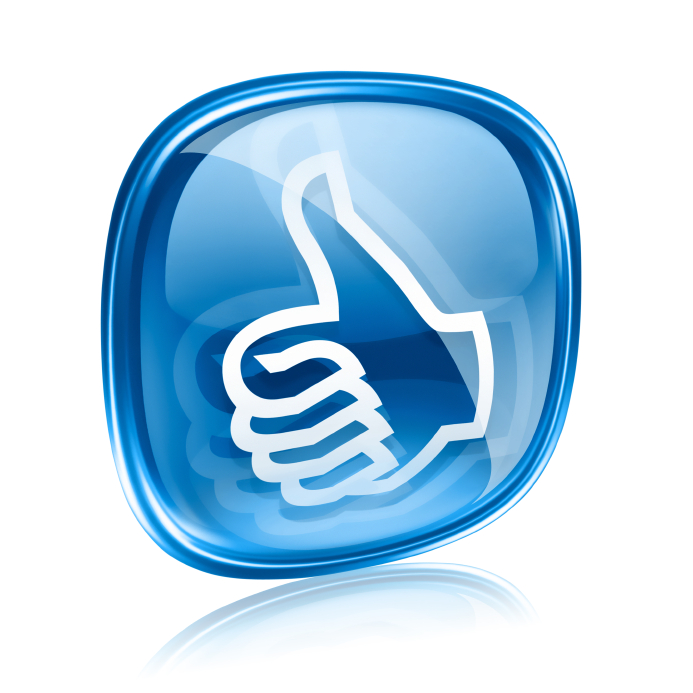 Blue thumbs up icon on glass