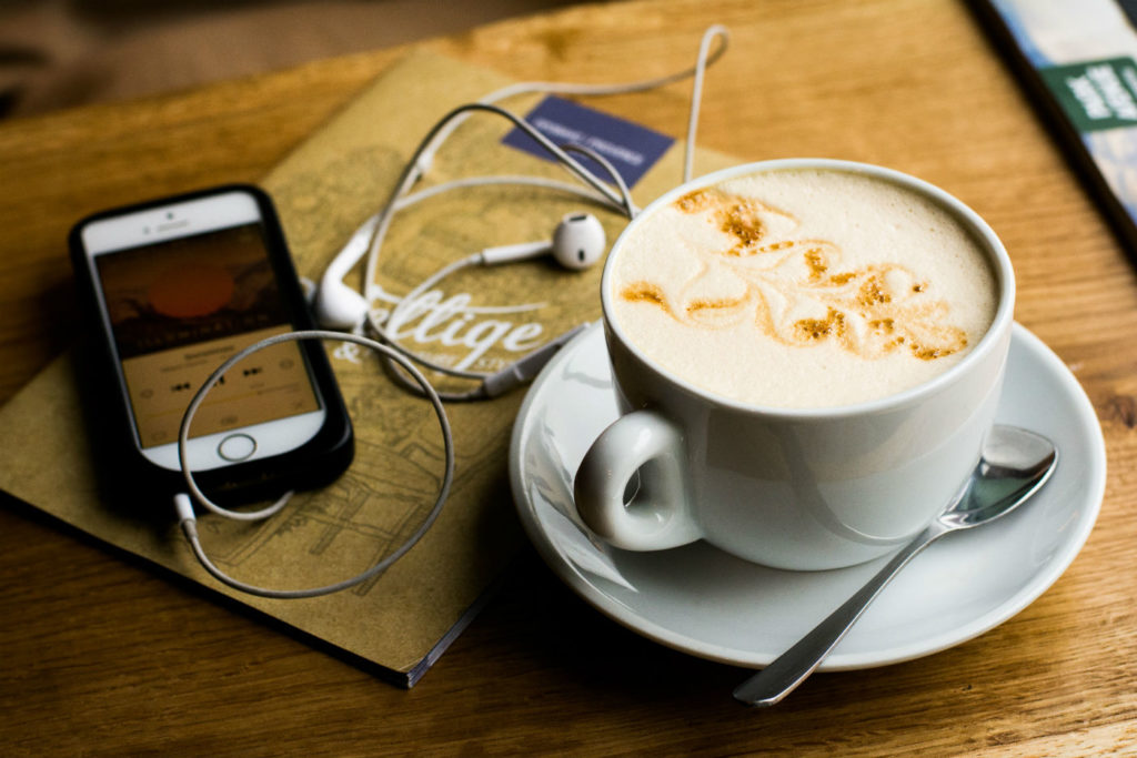 coffee on table with phone