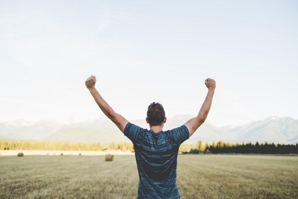 man celebrating Addiction recovery