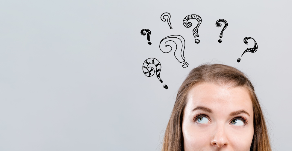 woman thinking about questions to ask a marketing agency