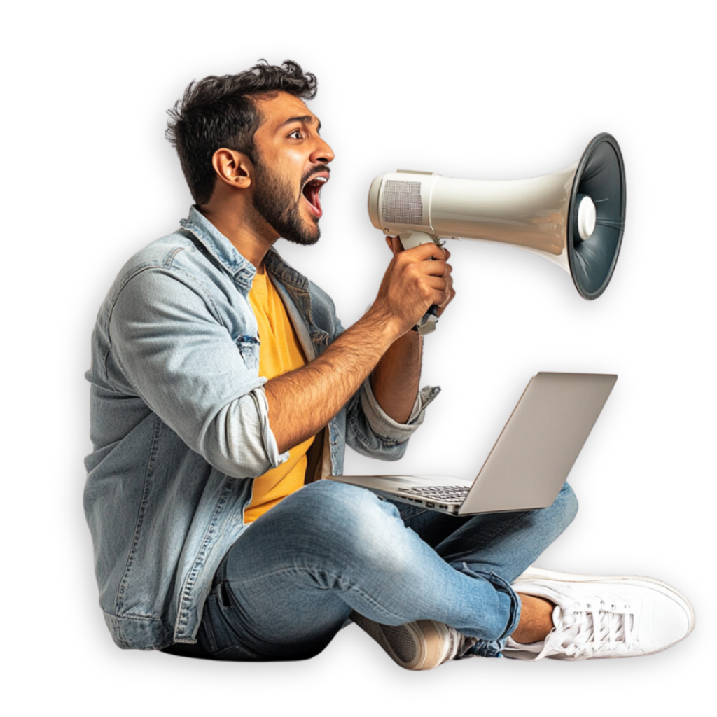 A person in a denim jacket holds a megaphone, sitting cross-legged with a laptop on their lap, embodying the essence of modern marketing strategy against a black background.