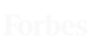 The image showcases the white "Forbes" logo on a sleek black background, embodying a masterful marketing strategy in branding.